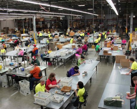 wide image of all the workers doing product fulfillment